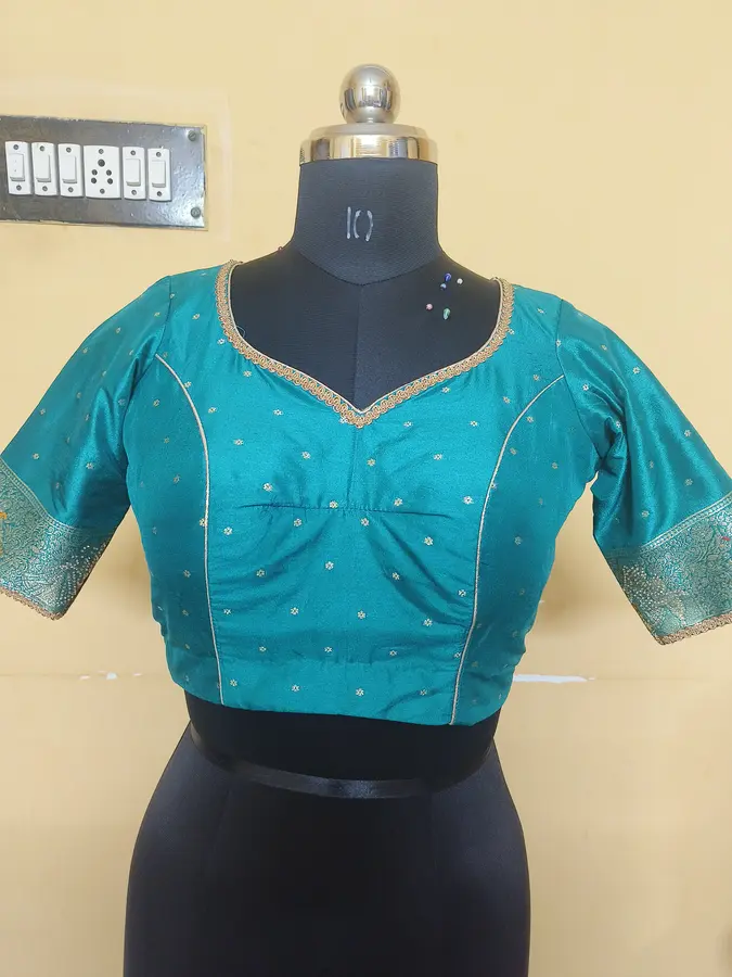 Teal silk, fine gold dot weave, gold trim neckline